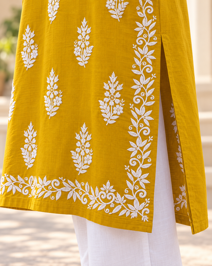 Marigold Yellow Embroidered Cotton Kurta embroidered hem and side cut closeup